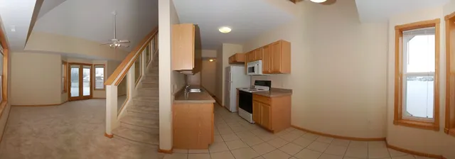 Galley kitchen with full appliances